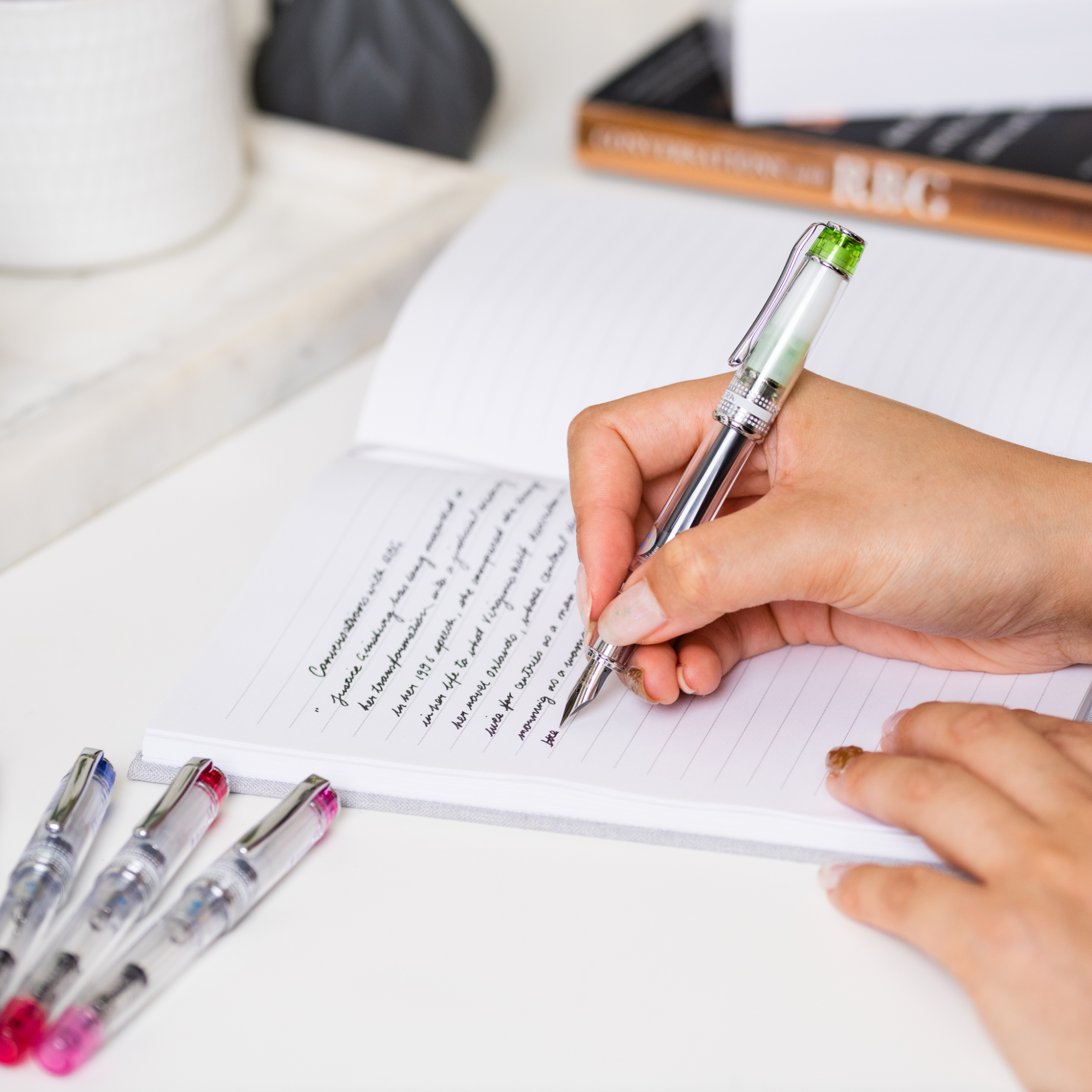 Open notebook filled with neat, elegant handwriting written using a good quality pen, showcasing one of the best pens for writing smoothly and clearly.