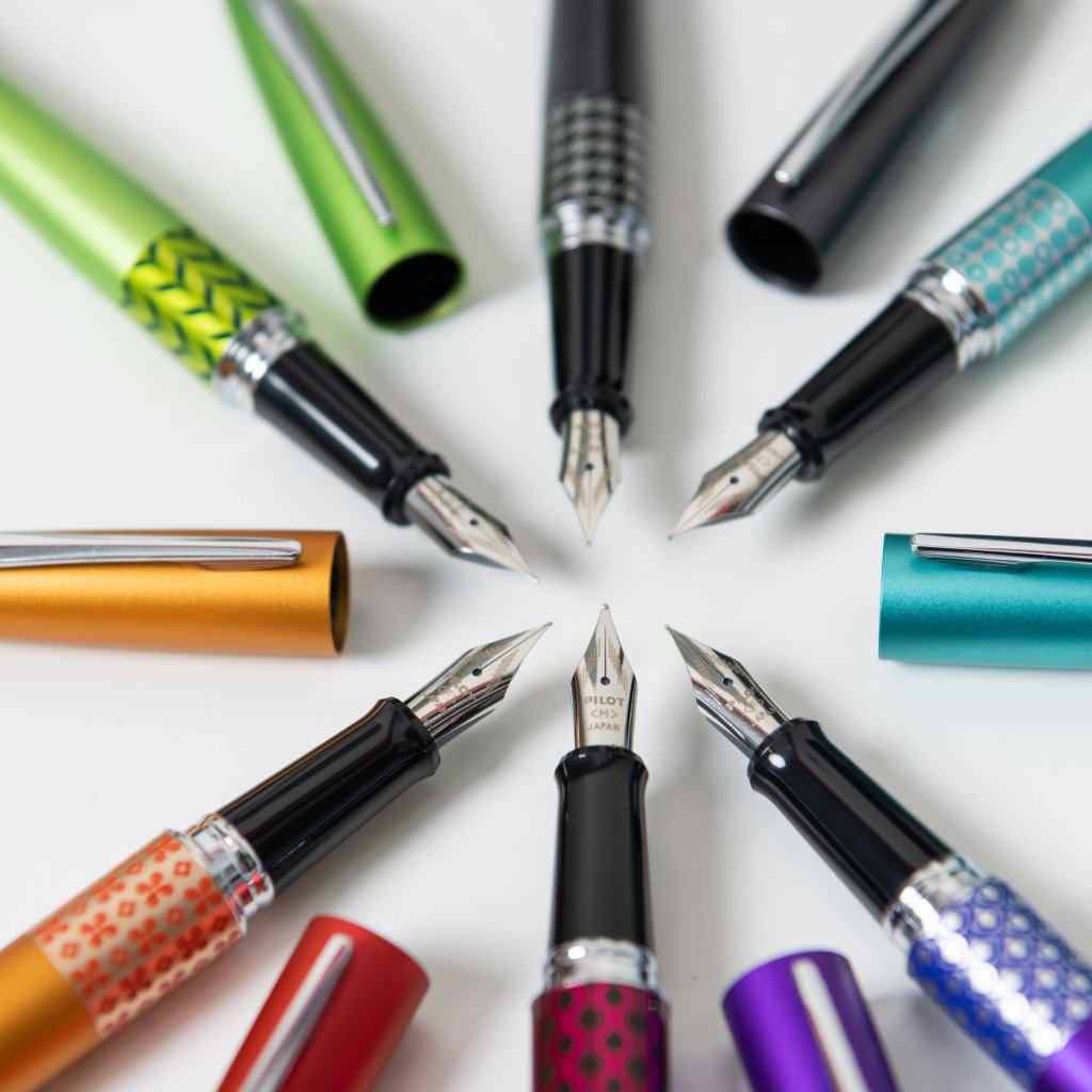 Pilot MR3 Fountain Pens in Retro Pop colours, arranged in a starburst.