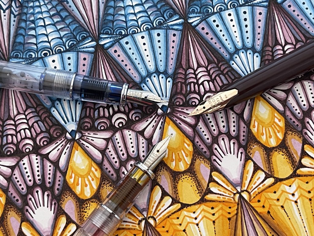 Close up of Candace's art, using iroshizuku ink in Rikka (a blue), Syun-gyo (a Red-Brown) and To-ro (a yellow), featuring with her fountain pens of choice: two PILOT Preras and an E95s.